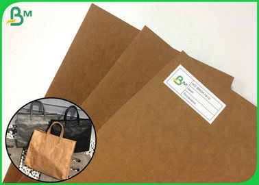 メッセンジャー袋を作る新式の再使用可能な、折り畳み式の洗濯できるクラフト紙