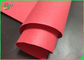 0.3mm 0.55mm再生利用できる赤いクラフト紙の生地のロールスロイスの洗濯できるハンドバッグ材料